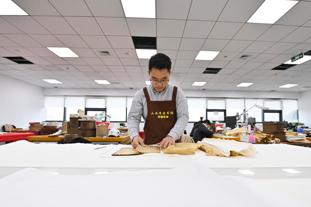 我為古籍做&ldquo;微創(chuàng  )&rdquo;